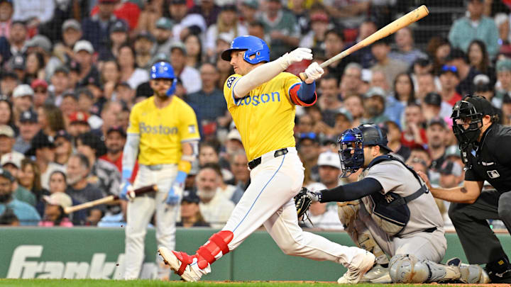 Boston Red Sox third baseman Alex Bregman hits a home run against the New York Yankees during fifth inning inning at Fenway Park. Boston Red Sox third baseman Alex Bregman hits a home run against the New York Yankees during fifth inning inning at Fenway Park.