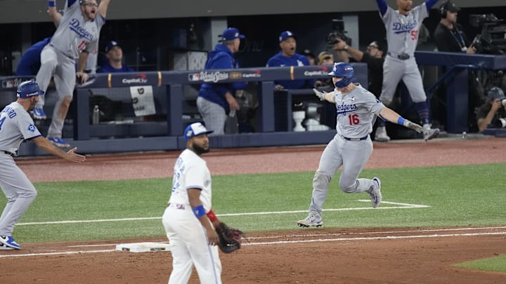 Nov 1, 2025; Toronto, Ontario, CAN; Los Angeles Dodgers catcher Will Smith (16) runs after hitting a home run against the Toronto Blue Jays in the eleventh inning during game seven of the 2025 MLB World Series at Rogers Centre. Mandatory Credit: Kevin Sousa-Imagn Images