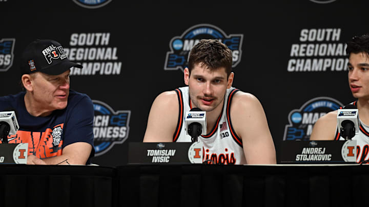 Mar 28, 2026; Houston, TX, USA; Illinois Fighting Illini center Tomislav Ivisic (13) speaks in a press conference after defeating the Iowa Hawkeyes in an Elite Eight game of the South Regional of the men's 2026 NCAA Tournament at Toyota Center. Mandatory Credit: Maria Lysaker-Imagn Images Mar 28, 2026; Houston, TX, USA; Illinois Fighting Illini center Tomislav Ivisic (13) speaks in a press conference after defeating the Iowa Hawkeyes in an Elite Eight game of the South Regional of the men's 2026 NCAA Tournament at Toyota Center. Mandatory Credit: Maria Lysaker-Imagn Images