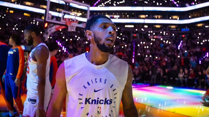 Nov 20, 2024; Phoenix, Arizona, USA; New York Knicks guard Cameron Payne (1) against the Phoenix Suns at Footprint Center. Mandatory Credit: Mark J. Rebilas-Imagn Images