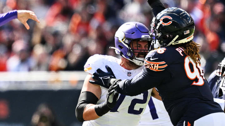 Oct 15, 2023; Chicago, Illinois, USA;  Minnesota Vikings guard Ezra Cleveland (72) blocks against the Chicago Bears at Soldier Field. Mandatory Credit: Jamie Sabau-USA TODAY Sports