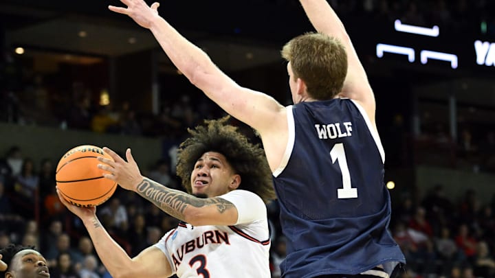 Mar 22, 2024; Spokane, WA, USA; Auburn Tigers guard Tre Donaldson (3) attempts a basket against Yale