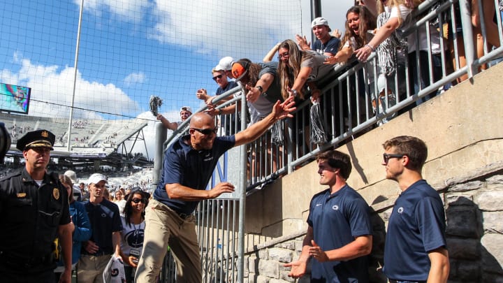 Penn State football coach James Franklin celebrates with students following a Nittany Lions victory at Beaver Stadium. Penn State football coach James Franklin celebrates with students following a Nittany Lions victory at Beaver Stadium.