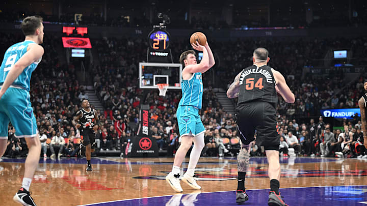 Nov 17, 2025; Toronto, Ontario, CAN; Charlotte Hornets forward Kon Knueppel (7) shoots the ball against Toronto Raptors center Sandro Mamukelashvili (54) in the second half at Scotiabank Arena. Mandatory Credit: Dan Hamilton-Imagn Images Nov 17, 2025; Toronto, Ontario, CAN; Charlotte Hornets forward Kon Knueppel (7) shoots the ball against Toronto Raptors center Sandro Mamukelashvili (54) in the second half at Scotiabank Arena. Mandatory Credit: Dan Hamilton-Imagn Images