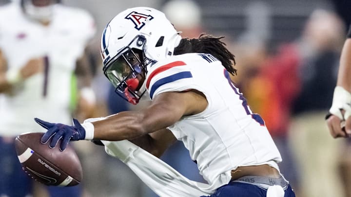 Nov 28, 2025; Tempe, Arizona, USA; Arizona Wildcats wide receiver Javin Whatley (6) celebrates a first down catch against the Arizona State Sun Devils in the second half during the 99th Territorial Cup at Mountain America Stadium. Mandatory Credit: Mark J. Rebilas-Imagn Images