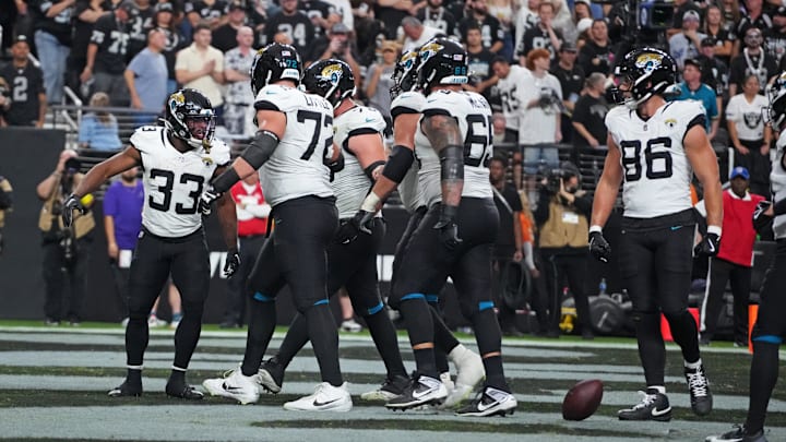 Nov 2, 2025; Paradise, Nevada, USA; Jacksonville Jaguars running back Bhayshul Tuten (33) celebrates after a touchdown during the second half against the Las Vegas Raiders at Allegiant Stadium. Mandatory Credit: Kirby Lee-Imagn Images