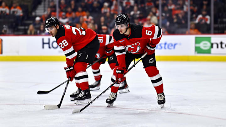 Apr 13, 2024; Philadelphia, Pennsylvania, USA; New Jersey Devils defenseman John Marino (6) readies for a faceoff against the Philadelphia Flyers in the first period at Wells Fargo Center. Mandatory Credit: Kyle Ross-Imagn Images