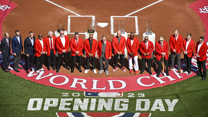 Mar 30, 2023; St. Louis, Missouri, USA; St. Louis Cardinals red jacket hall of famers pose for a photo in front of World Series trophies before an opening day game against the Toronto Blue Jays at Busch Stadium. Mandatory Credit: Jeff Curry-Imagn Images Mar 30, 2023; St. Louis, Missouri, USA; St. Louis Cardinals red jacket hall of famers pose for a photo in front of World Series trophies before an opening day game against the Toronto Blue Jays at Busch Stadium. Mandatory Credit: Jeff Curry-Imagn Images