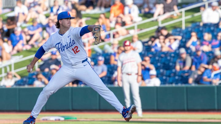 Florida's pitcher Liam Peterson (12) pitches against Alabama in Game 1 of the weekend series. Florida came back from being down 5-0 to beat Alabama 7-6, Friday, May 15, 2025, at Condron Family Ballpark in Gainesville, Florida. [Cyndi Chambers/ Gainesville Sun] 2025