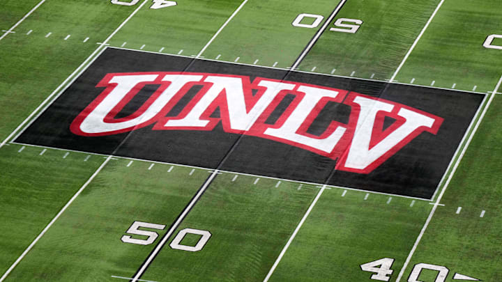 The UNLV Rebels logo at midfield during the Mountain West Championship at Allegiant Stadium. Mandatory Credit: Kirby Lee-Imagn Images