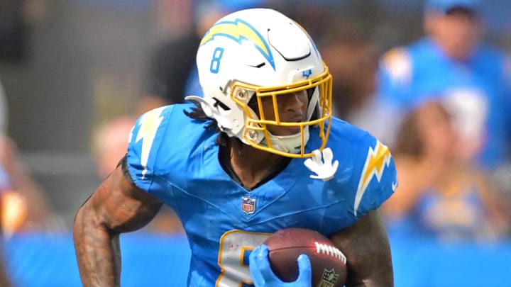 Oct 5, 2025; Inglewood, California, USA; Los Angeles Chargers running back Omarion Hampton (8) carries the ball against the Washington Commanders at SoFi Stadium. Oct 5, 2025; Inglewood, California, USA; Los Angeles Chargers running back Omarion Hampton (8) carries the ball against the Washington Commanders at SoFi Stadium.