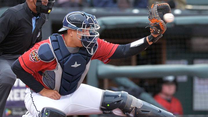 Erie SeaWolves catcher Thayron Liranzo works against the Harrisburg Senators on opening day at UPMC Park in Erie on April 4, 2025. Home plate umpire Elliott Melton is at left. Erie SeaWolves catcher Thayron Liranzo works against the Harrisburg Senators on opening day at UPMC Park in Erie on April 4, 2025. Home plate umpire Elliott Melton is at left.