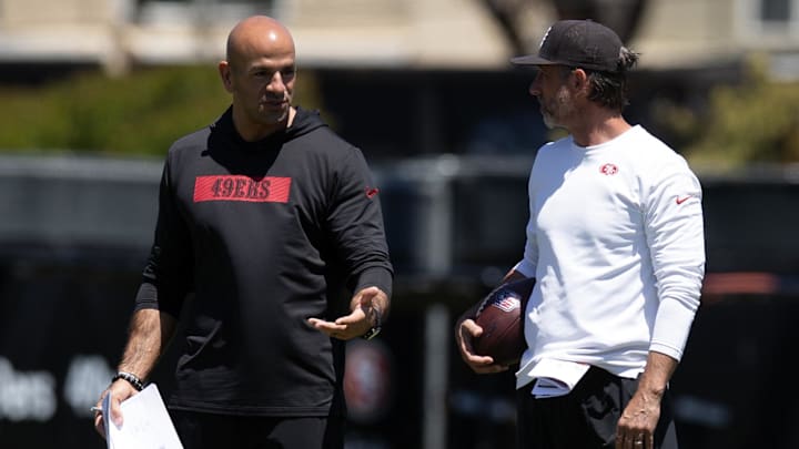 May 9, 2025; Santa Clara, CA, USA; San Francisco 49ers head coach Kyle Shanahan, right, confers with defensive coordinator Robert Saleh during the teamís rookie minicamp. Mandatory Credit: D. Ross Cameron-Imagn Images
