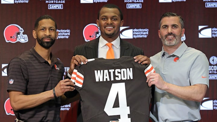 Cleveland Browns quarterback Deshaun Watson, center, poses for a portrait with general manager Andrew Berry, left, and coach Kevin Stefanski during Watson's introductory news conference on March 26, 2022, at the Browns training facility in Berea. Cleveland Browns quarterback Deshaun Watson, center, poses for a portrait with general manager Andrew Berry, left, and coach Kevin Stefanski during Watson's introductory news conference on March 26, 2022, at the Browns training facility in Berea.