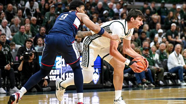 Michigan State’s Anton Bonke, right, looks to pass as UConn’s Na’jai Hines defends during the first half on Tuesday, Oct. 20, 2026, at the Breslin Center in East Lansing. Michigan State’s Anton Bonke, right, looks to pass as UConn’s Na’jai Hines defends during the first half on Tuesday, Oct. 20, 2026, at the Breslin Center in East Lansing.