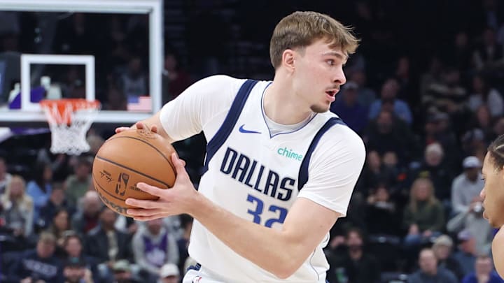 Dec 15, 2025; Salt Lake City, Utah, USA; Dallas Mavericks forward Cooper Flagg (32) controls the ball as Utah Jazz guard Keyonte George (3) defends during the first quarter at Delta Center. Mandatory Credit: Rob Gray-Imagn Images Dec 15, 2025; Salt Lake City, Utah, USA; Dallas Mavericks forward Cooper Flagg (32) controls the ball as Utah Jazz guard Keyonte George (3) defends during the first quarter at Delta Center. Mandatory Credit: Rob Gray-Imagn Images
