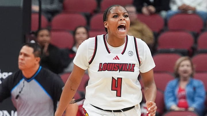 Louisville Cardinals forward Mackenly Randolph (4) celebrates as the Cards increase their lead over Southern Indiana University Friday night at the KFC Yum! Center in Louisville, Ky. Nov. 8, 2024. Louisville Cardinals forward Mackenly Randolph (4) celebrates as the Cards increase their lead over Southern Indiana University Friday night at the KFC Yum! Center in Louisville, Ky. Nov. 8, 2024.