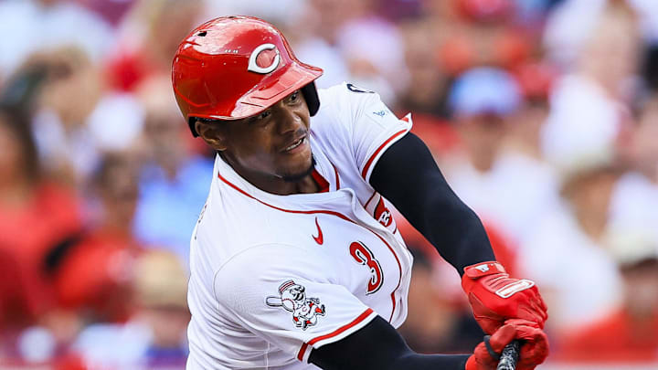 Aug 13, 2025; Cincinnati, Ohio, USA; Cincinnati Reds third baseman Ke'Bryan Hayes (3) hits a single in the third inning against the Philadelphia Phillies at Great American Ball Park. Mandatory Credit: Katie Stratman-Imagn Images