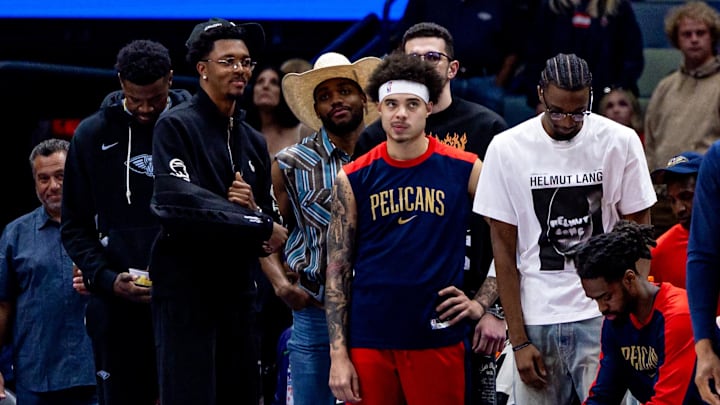 Apr 11, 2025; New Orleans, Louisiana, USA;  New Orleans Pelicans bench reacts to a play against the Miami Heat during the first half at Smoothie King Center. Mandatory Credit: Stephen Lew-Imagn Images