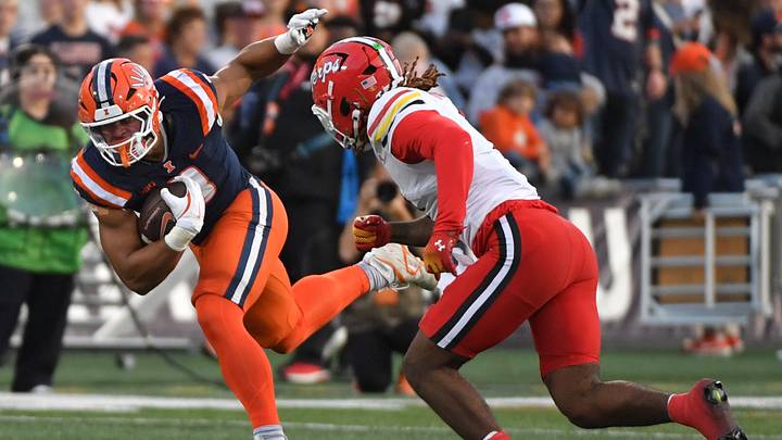 Illinois Fighting Illini running back Kaden Feagin (3) is pursued by Maryland Terrapins linebacker Daniel Wingate (1) during the first half at Memorial Stadium. Illinois Fighting Illini running back Kaden Feagin (3) is pursued by Maryland Terrapins linebacker Daniel Wingate (1) during the first half at Memorial Stadium.
