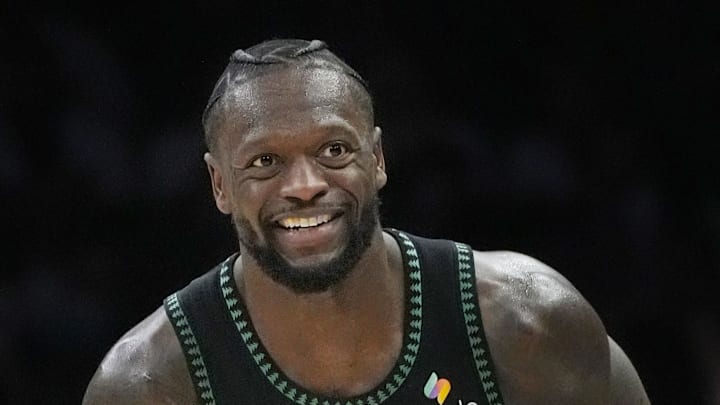 Jan 6, 2026; Minneapolis, Minnesota, USA; Minnesota Timberwolves forward Julius Randle (30) celebrates his three-point basket against the Miami Heat that beat the shot clock in the third quarter at Target Center. Mandatory Credit: Bruce Kluckhohn-Imagn Images