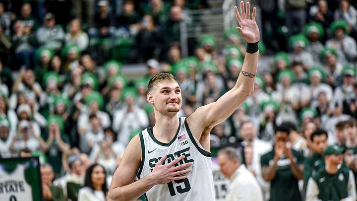 Michigan State's Carson Cooper acknowledges the fans during the senior night ceremony after the Spartans win over Rutgers on Thursday, March 5, 2026, at the Breslin Center in East Lansing. Michigan State's Carson Cooper acknowledges the fans during the senior night ceremony after the Spartans win over Rutgers on Thursday, March 5, 2026, at the Breslin Center in East Lansing.