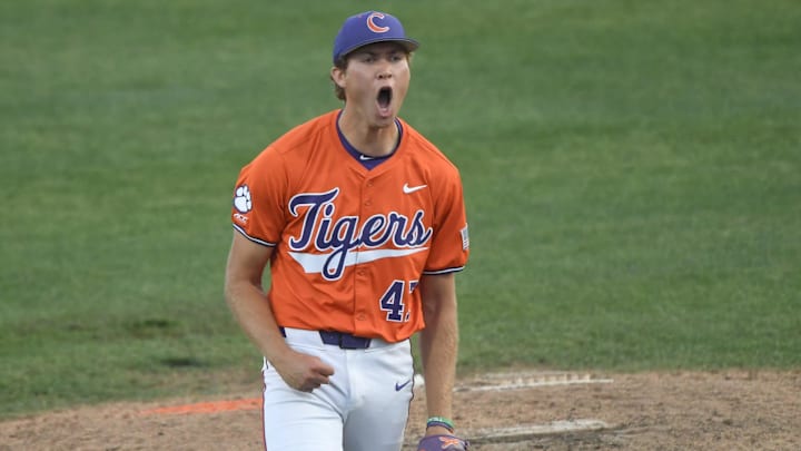 Clemson senior Lucas Mahlstedt (47) reacts after closing out the game against University of Louisville at Doug Kingsmore Stadum in Clemson, S.C. Friday, April 18, 2025. Clemson won 2-1, taking the ACC series.