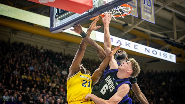 Hannes Steinbach found it physical inside against Michigan, dealing here with Morez Johnson Jr.