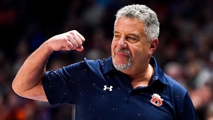 Auburn head coach Bruce Pearl celebrates during the second half of the SEC tournament championship