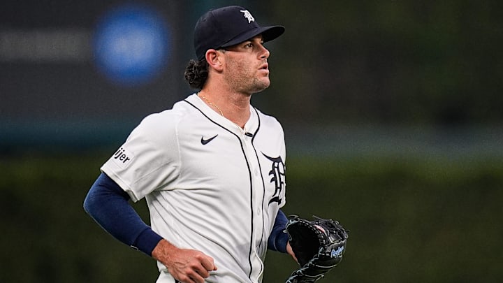 Detroit Tigers pitcher Kyle Finnegan (64) runs out of the bullpen for ninth inning against Minnesota Twins at Comerica Park in Detroit in Monday, August 4, 2025.