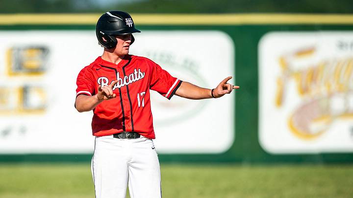 Western Dubuque's Brett Harris reacts after hitting a double during a high school baseball game against Cedar Rapids Kennedy, Tuesday, May 30, 2023, at Farley Community Park in Farley, Iowa. Western Dubuque's Brett Harris reacts after hitting a double during a high school baseball game against Cedar Rapids Kennedy, Tuesday, May 30, 2023, at Farley Community Park in Farley, Iowa.