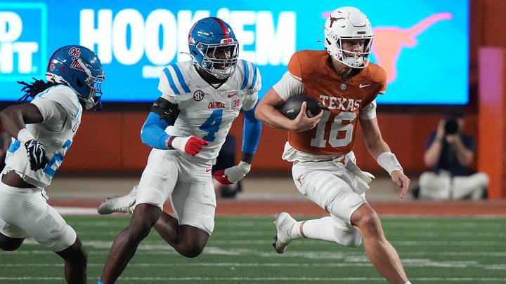 Texas Longhorns quarterback Arch Manning runs with the ball as Mississippi Rebels linebacker Suntarine Perkins pursues during the first half at Darrell K Royal-Texas Memorial Stadium. Mandatory Credit: Scott Wachter-Imagn Images Texas Longhorns quarterback Arch Manning runs with the ball as Mississippi Rebels linebacker Suntarine Perkins pursues during the first half at Darrell K Royal-Texas Memorial Stadium. Mandatory Credit: Scott Wachter-Imagn Images