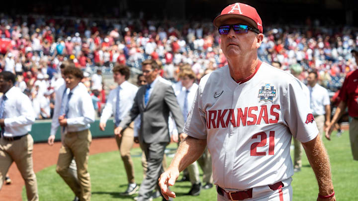 Jun 18, 2022; Omaha, NE, USA; Arkansas Razorbacks coach Dave Van Horn walks off the field after the national anthem before the game against the Stanford Cardinal at Charles Schwab Field. Mandatory Credit: Dylan Widger-Imagn Images