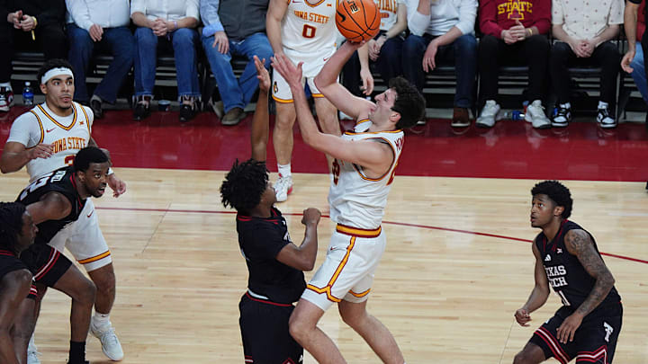 Iowa State Cyclones forward Milan Momcilovic (22) shoots the ball over Texas Tech Red Raiders forward Josiah Moseley (5) during the second half in the Big-12 conference men’s basketball showdown on Feb. 28, 2026, at Hilton Coliseum in Ames, Iowa. Iowa State Cyclones forward Milan Momcilovic (22) shoots the ball over Texas Tech Red Raiders forward Josiah Moseley (5) during the second half in the Big-12 conference men’s basketball showdown on Feb. 28, 2026, at Hilton Coliseum in Ames, Iowa.