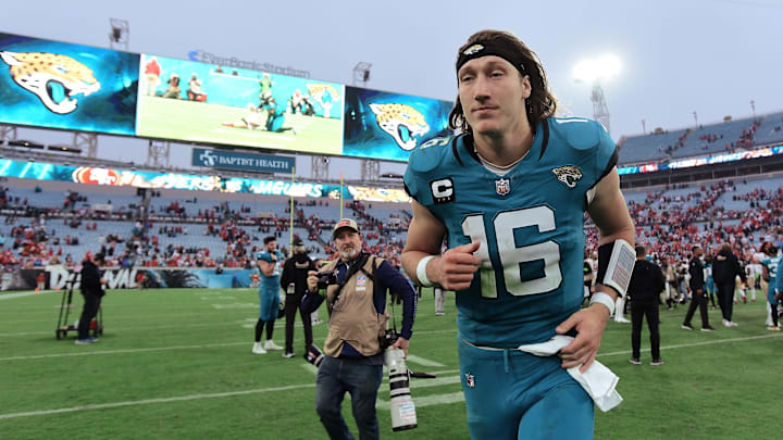 Jacksonville Jaguars quarterback Trevor Lawrence (16) runs off the field after Sunday's loss to the