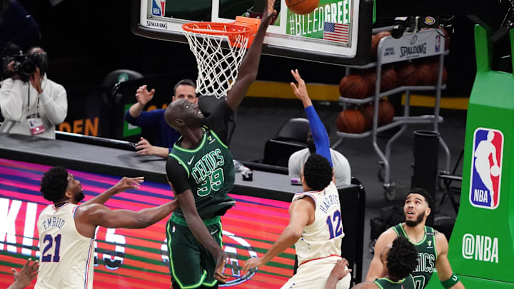 Apr 6, 2021; Boston, Massachusetts, USA; Boston Celtics center Tacko Fall (99) defends against Philadelphia 76ers forward Tobias Harris (12) in the second quarter at TD Garden. Mandatory Credit: David Butler II-Imagn Images