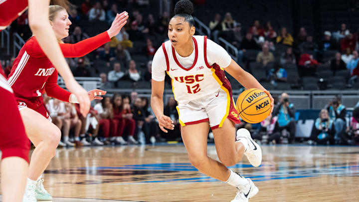 USC Trojans guard JuJu Watkins (12) drives Friday, March 7, 2025, agains the Indiana Hoosiers during the Big Ten women's tournament at Gainbridge Fieldhouse in Indianapolis. USC Trojans guard JuJu Watkins (12) drives Friday, March 7, 2025, agains the Indiana Hoosiers during the Big Ten women's tournament at Gainbridge Fieldhouse in Indianapolis.