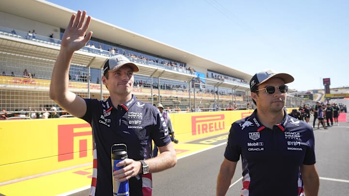 Oct 20, 2024; Austin, Texas, USA; Oracle Red Bull Racing drivers Max Verstappen, left, and Sergio Perez are introduced at the drivers parade at the Formula 1 Pirelli United States Grand Prix at Circuit of the Americas. Mandatory Credit: Jay Janner-Imagn Images