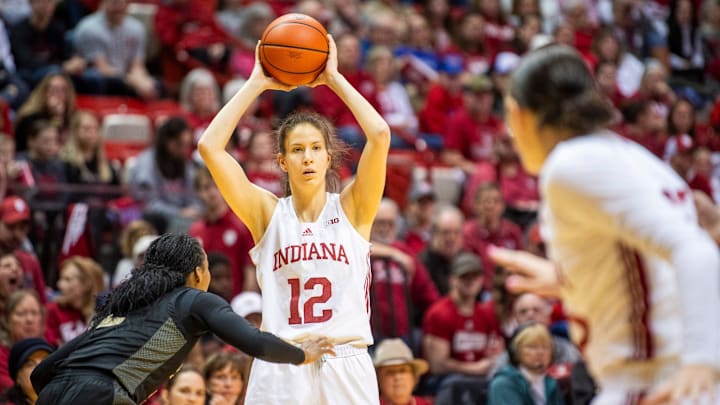 Indiana's Yarden Garzon (12) looks for Lilly Meister (52) during the Indiana versus Purdue women's basketball game at Simon Skjodt Assembly Hall on Saturday, Feb. 15, 2025.