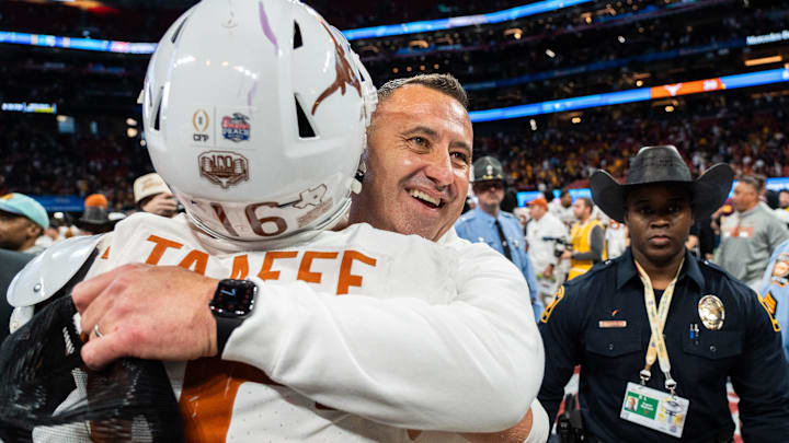 Texas Longhorns head coach Steve Sarkisian embraces Texas Longhorns defensive back Michael Taaffe (16) as they celebrate their win in the Peach Bowl College Football Playoff quarterfinal against Arizona State at Mercedes-Benz Stadium in Atlanta, Georgia, Jan. 1, 2025. Texas Longhorns head coach Steve Sarkisian embraces Texas Longhorns defensive back Michael Taaffe (16) as they celebrate their win in the Peach Bowl College Football Playoff quarterfinal against Arizona State at Mercedes-Benz Stadium in Atlanta, Georgia, Jan. 1, 2025.