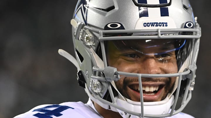 Dallas Cowboys quarterback Dak Prescott smiles on the field against the Philadelphia Eagles at Lincoln Financial Field.
