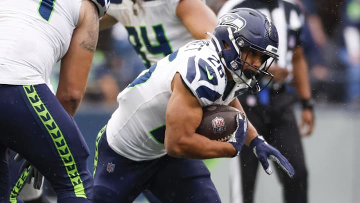 Sep 24, 2023; Seattle, Washington, USA; Seattle Seahawks running back Zach Charbonnet (26) rushes