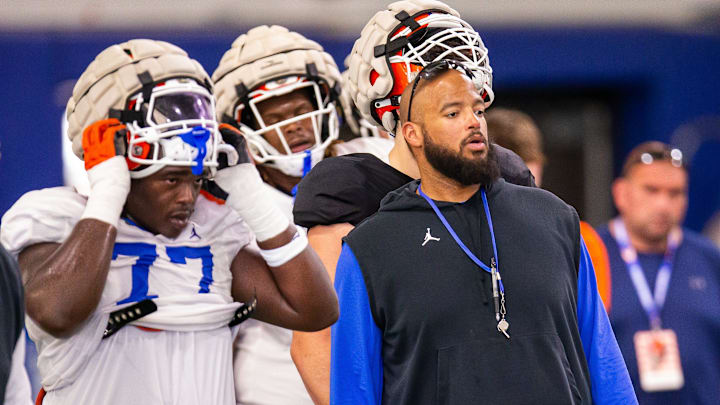 New Florida offensive line coach Jonathan Decoster runs blocking drills during Florida Gators’ last open Spring football practice before the Orange and Blue Game at Sanders Practice Fields in Gainesville, FL on Tuesday, April 9, 2024. [Doug Engle/Gainesville Sun]