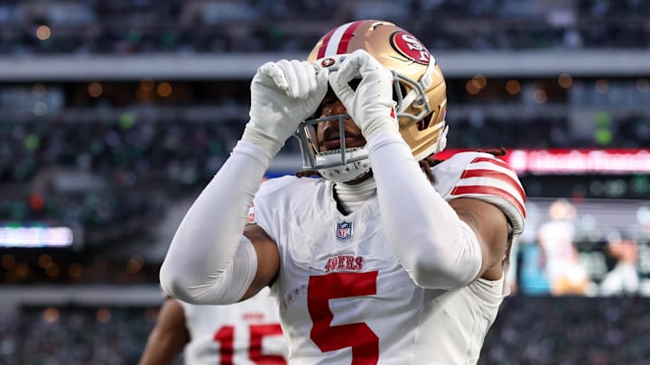 Jan 11, 2026; Philadelphia, PA, USA; San Francisco 49ers wide receiver Demarcus Robinson (5) celebrates a touchdown against the Philadelphia Eagles during the first quarter in an NFC Wild Card Round game at Lincoln Financial Field. Mandatory Credit: Bill Streicher-Imagn Images