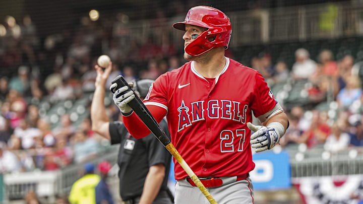 Jul 1, 2025; Cumberland, Georgia, USA; Los Angeles Angels designated hitter Mike Trout (27) reacts after striking out against the Atlanta Braves during the first inning at Truist Park. Mandatory Credit: Dale Zanine-Imagn Images