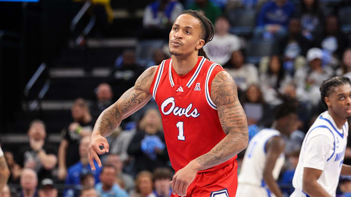 Feb 23, 2025; Memphis, Tennessee, USA; Florida Atlantic Owls forward Kaleb Glenn (1) reacts after a three point basket against the Memphis Tigers during the first half at FedExForum. Mandatory Credit: Wesley Hale-Imagn Images
