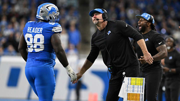 Nov 28, 2024; Detroit, Michigan, USA; Detroit Lions defensive tackle DJ Reader (98) celebrates with head coach Dan Campbell after sacking Chicago Bears quarterback Caleb Williams (18) in the fourth quarter at Ford Field. Mandatory Credit: Lon Horwedel-Imagn Images