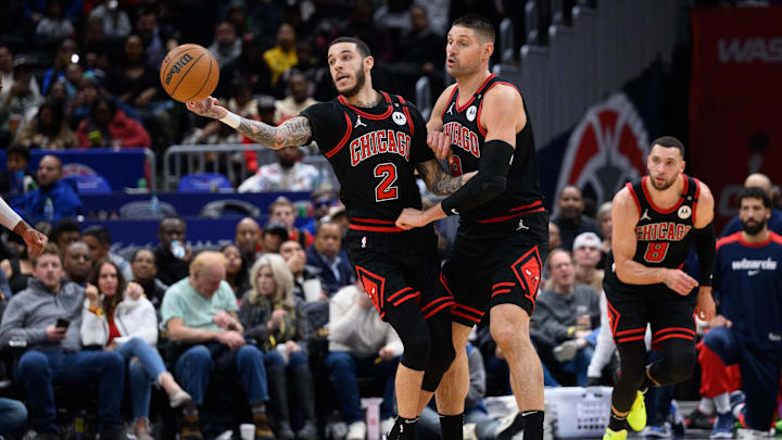 Jan 1, 2025; Washington, District of Columbia, USA; Chicago Bulls guard Lonzo Ball (2) and Chicago Bulls center Nikola Vucevic (9) 