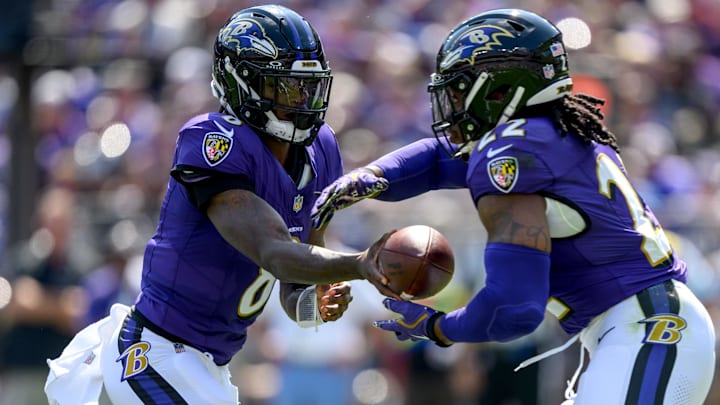 Baltimore Ravens quarterback Lamar Jackson (8) hands off to running back Derrick Henry (22) during the first half against the Las Vegas Raiders at M&T Bank Stadium. Baltimore Ravens quarterback Lamar Jackson (8) hands off to running back Derrick Henry (22) during the first half against the Las Vegas Raiders at M&T Bank Stadium.