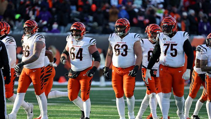 Dec 14, 2025; Cincinnati, Ohio, USA; Cincinnati Bengals center Ted Karras (64) and guard Dylan Fairchild (63) and offensive tackle Orlando Brown (75) line up for a play during the fourth quarter against the Baltimore Ravens at Paycor Stadium. Mandatory Credit: Joseph Maiorana-Imagn Images Dec 14, 2025; Cincinnati, Ohio, USA; Cincinnati Bengals center Ted Karras (64) and guard Dylan Fairchild (63) and offensive tackle Orlando Brown (75) line up for a play during the fourth quarter against the Baltimore Ravens at Paycor Stadium. Mandatory Credit: Joseph Maiorana-Imagn Images